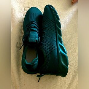 Two pair of Women’s workout sneakers size 8.